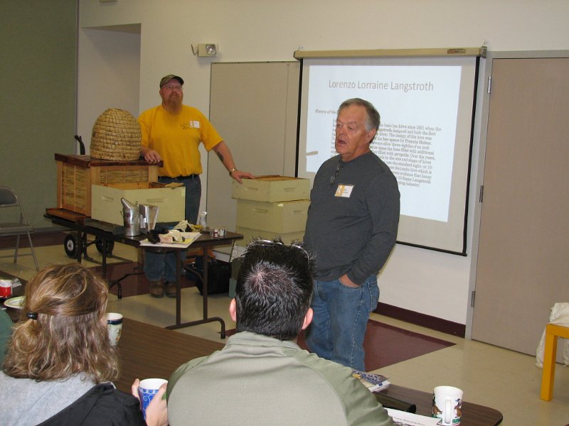 beecourse_day1 020.JPG - Allen (left) and Bill cover the Langstgroth hive components and other beekeeping tools and equipment.